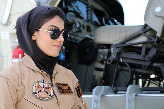 The first female pilot in Afghan Niloofar Rahmani get up to her plane. (Photo: Ghayor Waziri)