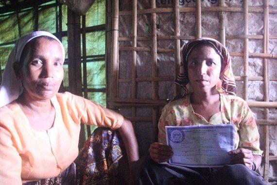 The white card holder, Asha Balcon, is one the Rohingyas who is fighting identity as a Rohingya. (Ph