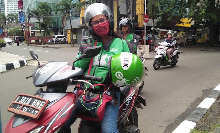Female driver, Rosinawati, in Jakarta. (Photo: Nicole Curby)