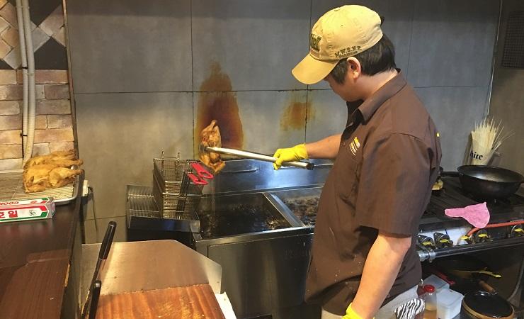 Frying chicken in South Korea (Photo: Jason Strother)
