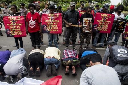 Kontras: Kok Penanganan Papua Berbeda?
